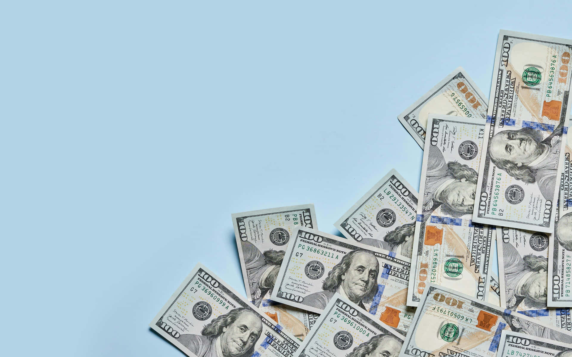 100 Dollar Bill Notes In Baby Blue Backdrop Background