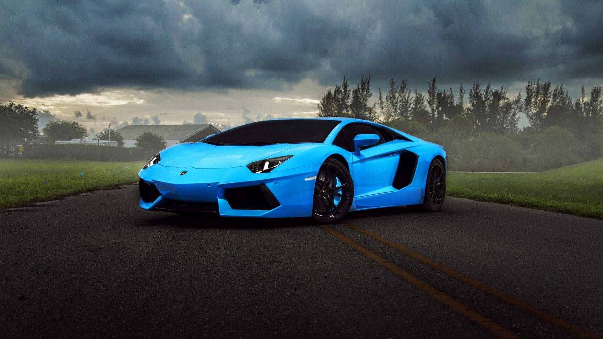 1080p Hd Blue Sports Car On Road Background