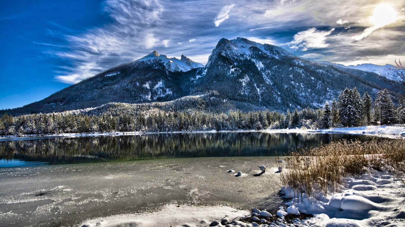 1366 X 768 Winter Mountain By Lake Background