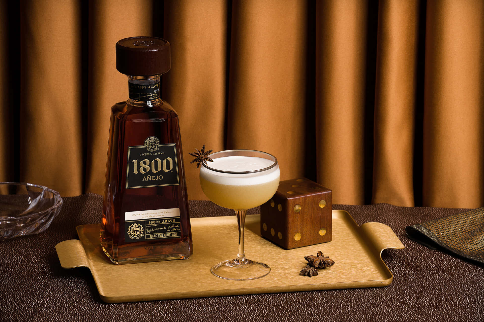 1800 Tequila Añejo And Barrel Sour Background