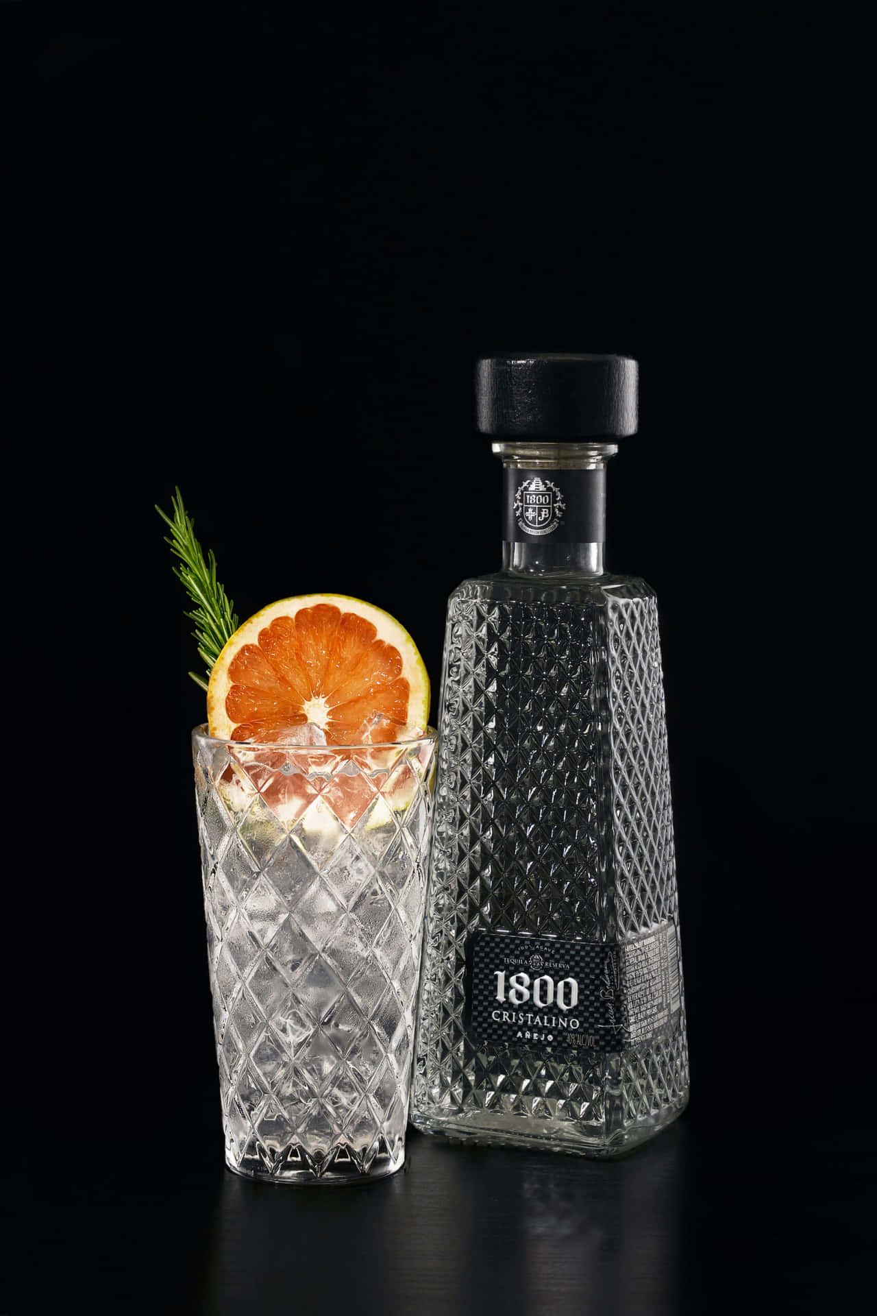 1800 Tequila Cristalino Anejo With Paloma Background