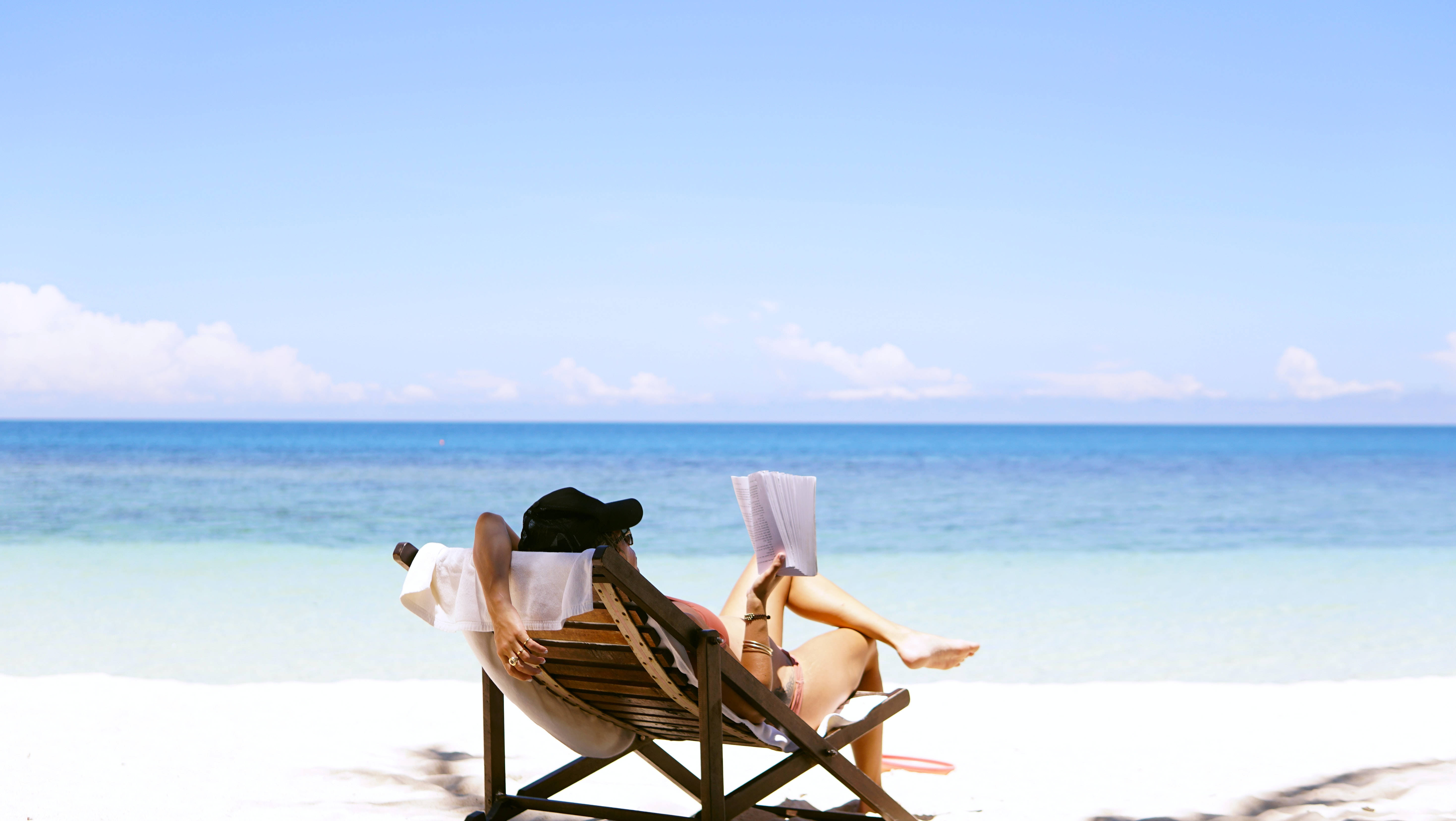 1920x1080 Hd Beach Desktop Relaxing On Deck Chair Background