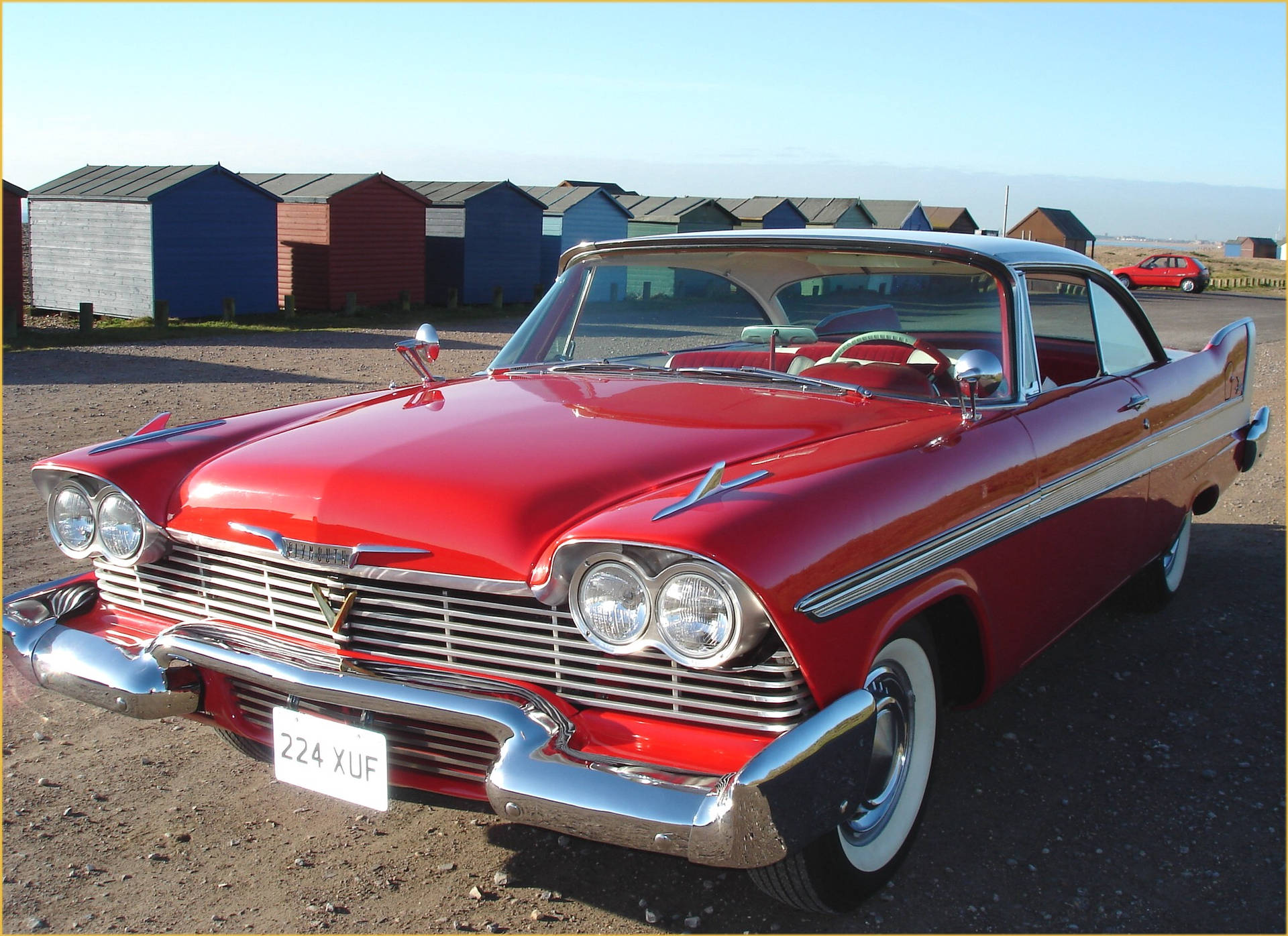 1958 Red Plymouth Fury Vintage Car Background