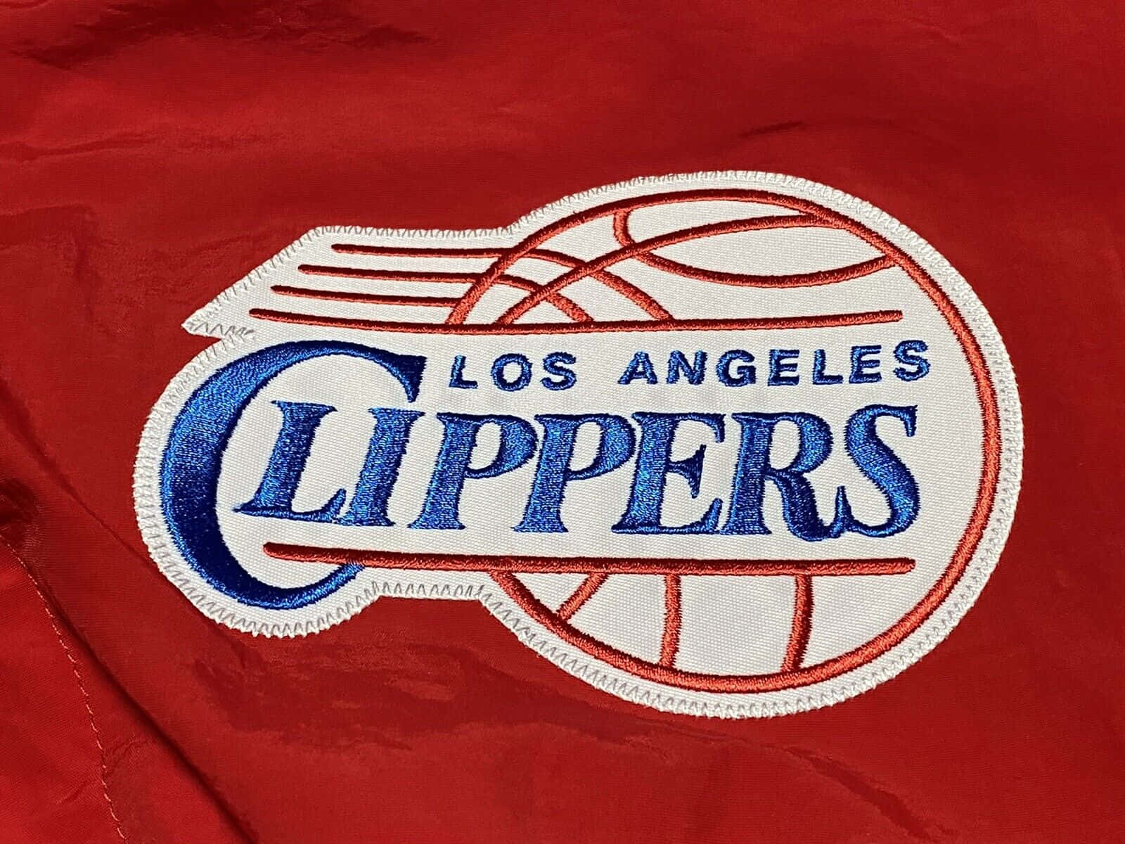 2010 La Clippers Embossed Logo Red Cloth Close Up Shot Background
