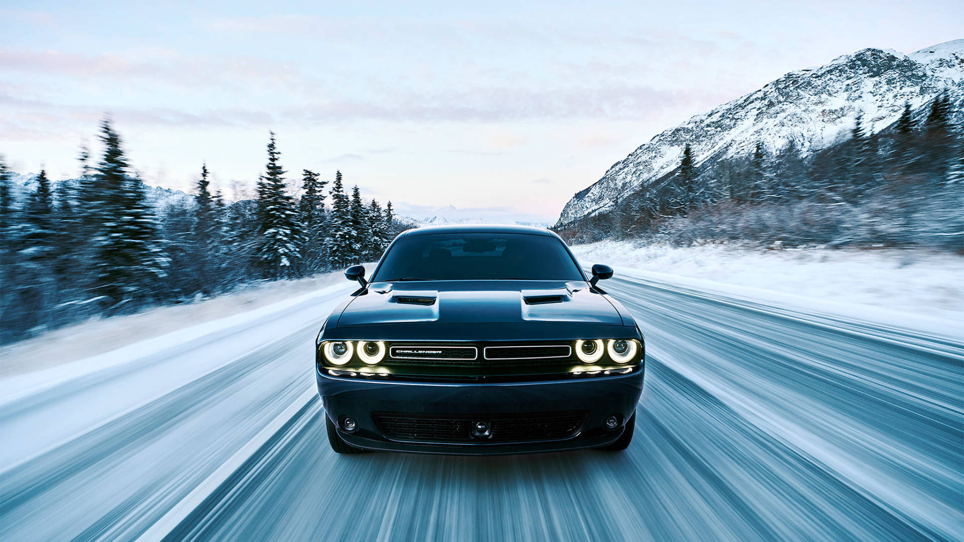 2017 Blue Dodge Challenger During Winter Background