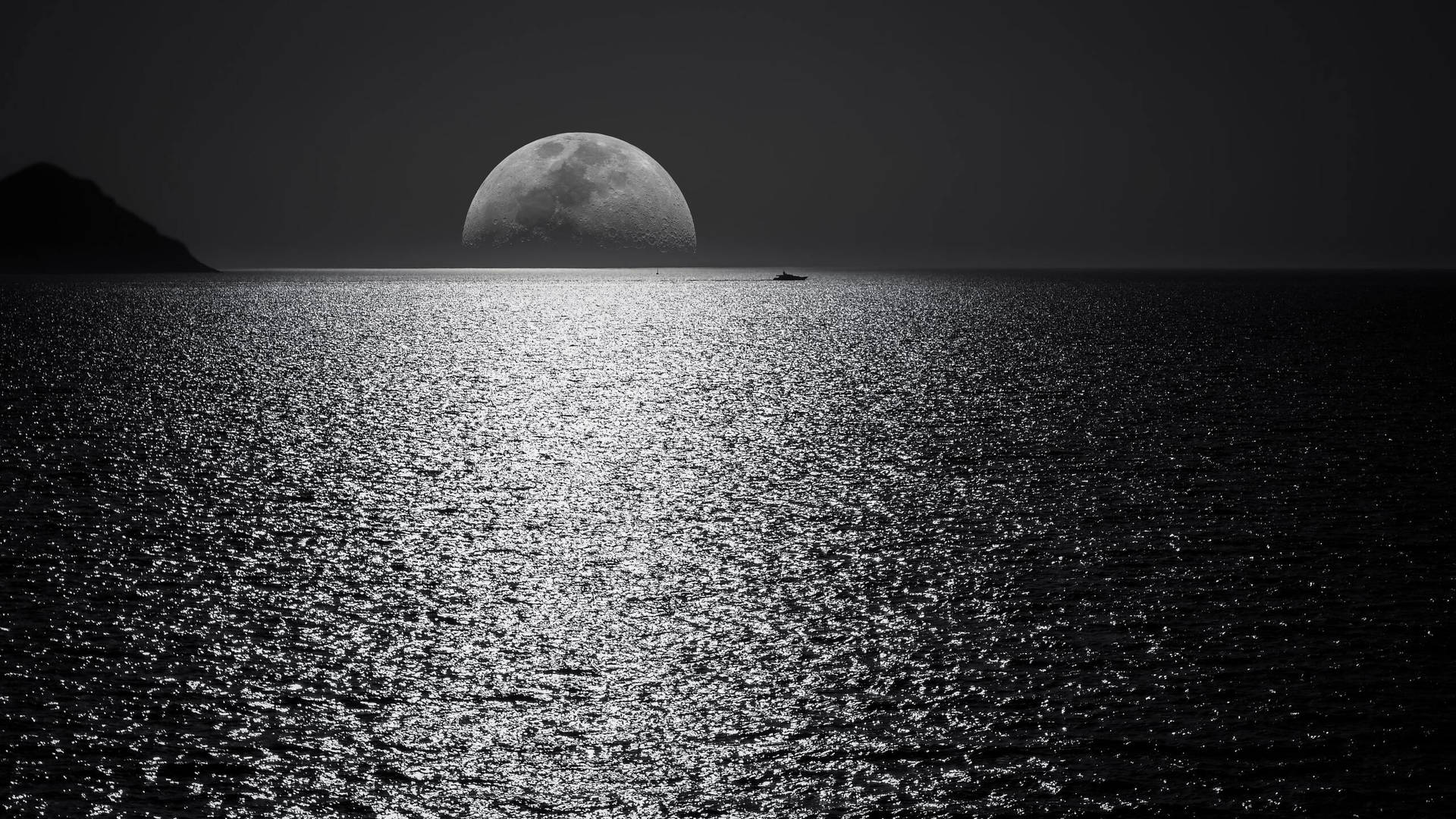 2560 X 1440 Large Moon At Sea Background