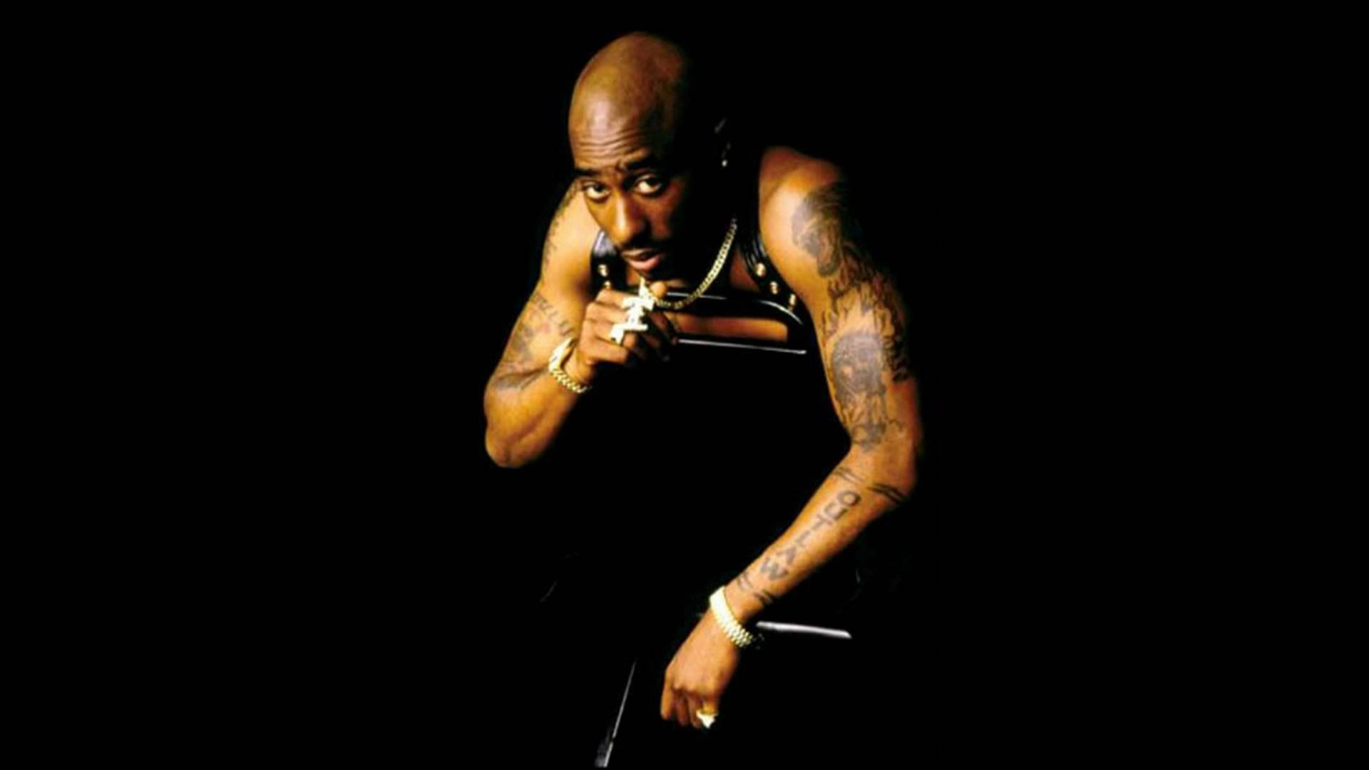2pac Showing Off Jewelry Background