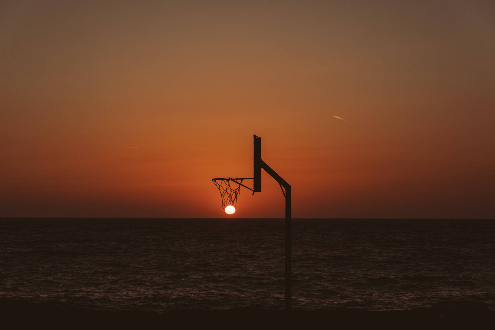 4k Basketball Ring And Sunset Background