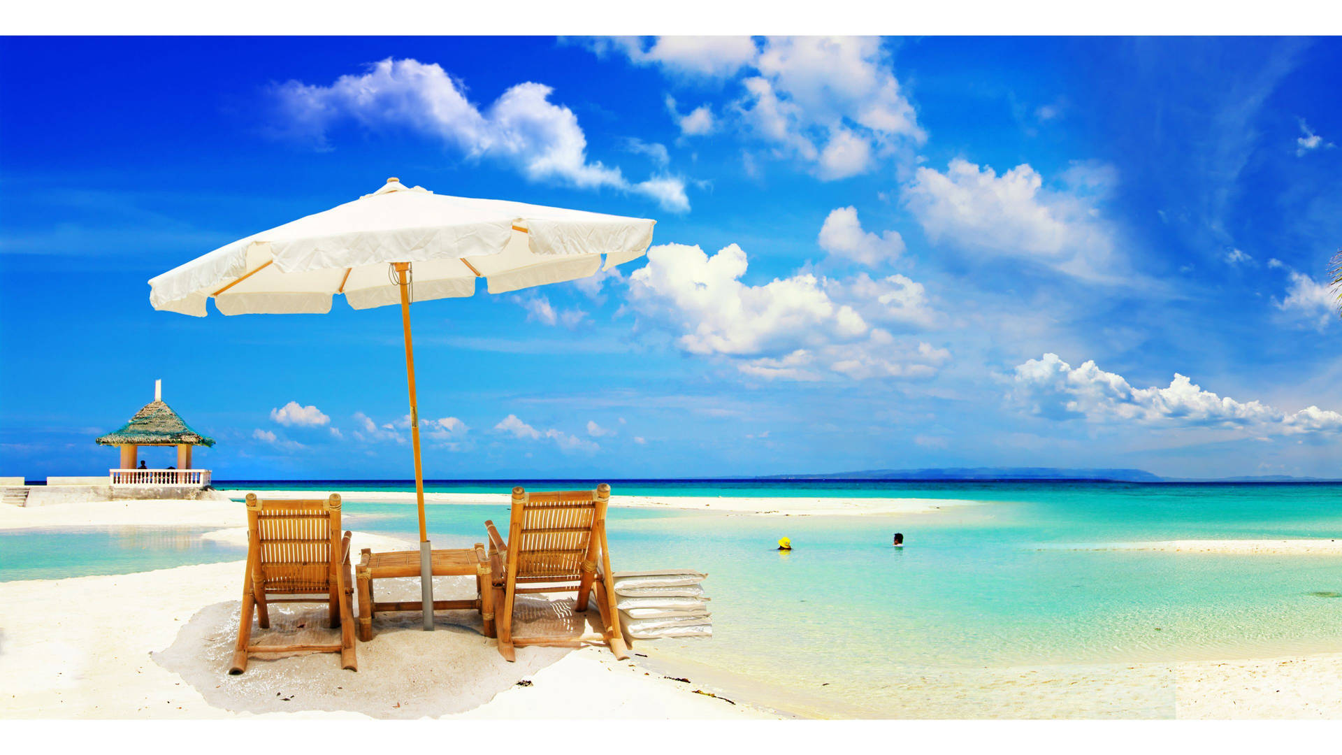 4k Beach Umbrella In Sand Background