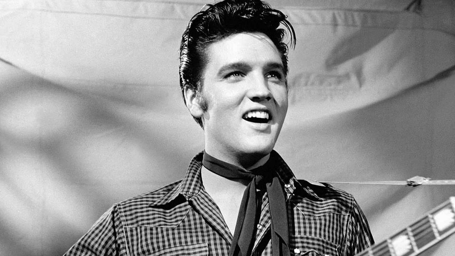 4k Elvis Smiling At The Audience Background