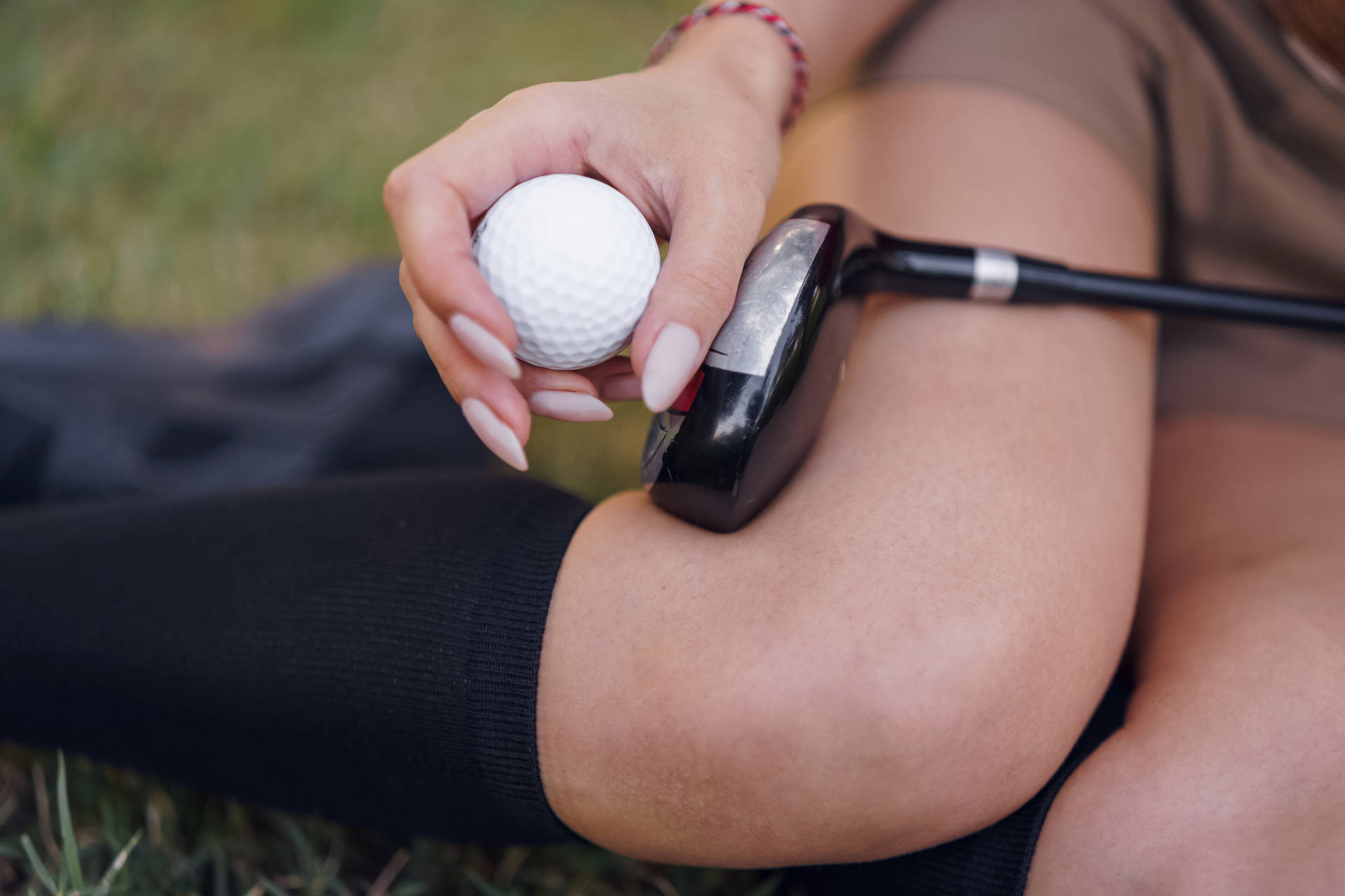 4k Golfer Holding Golf Ball And Club