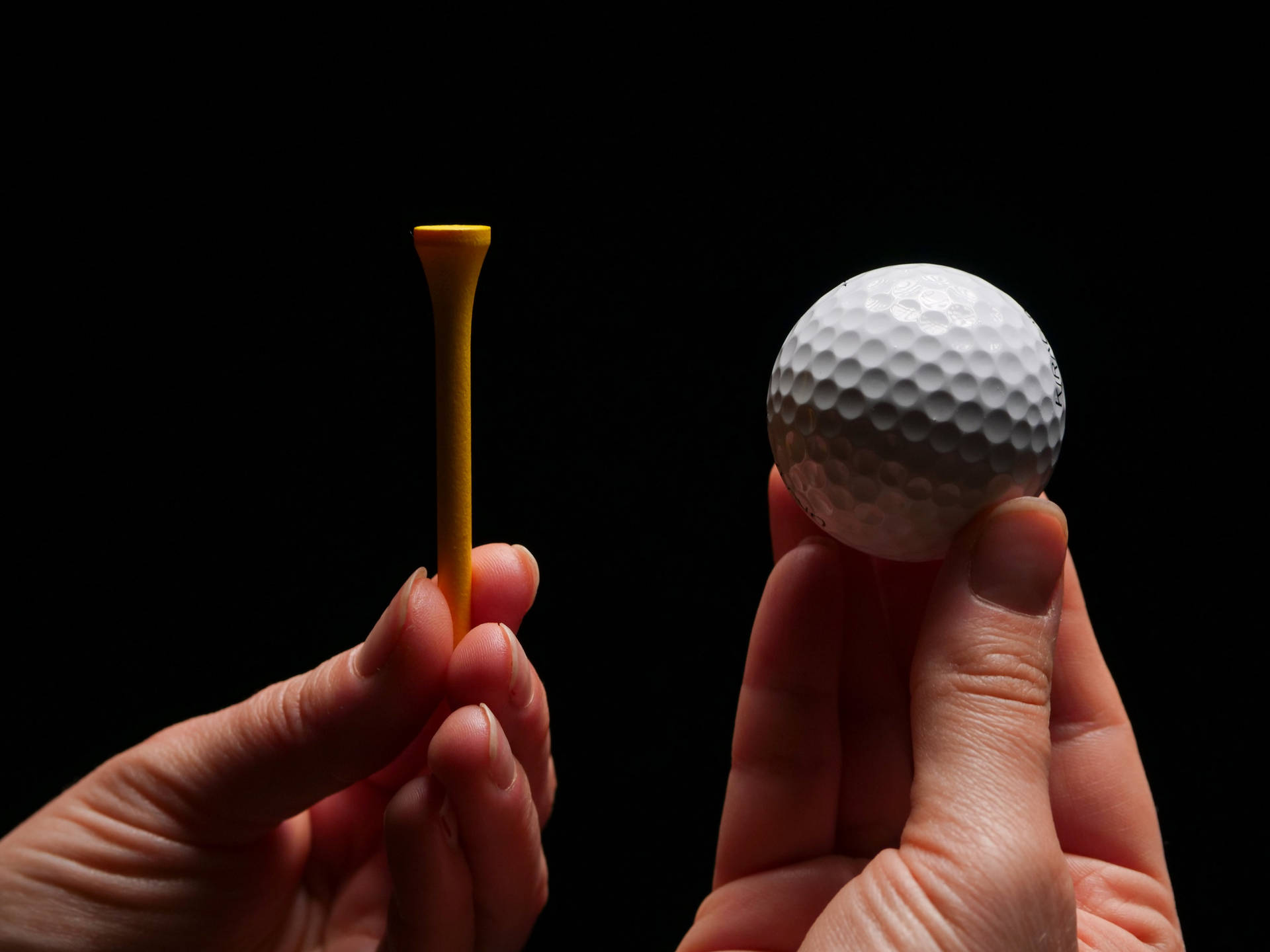 4k Hands Holding Golf Tee And Ball Background