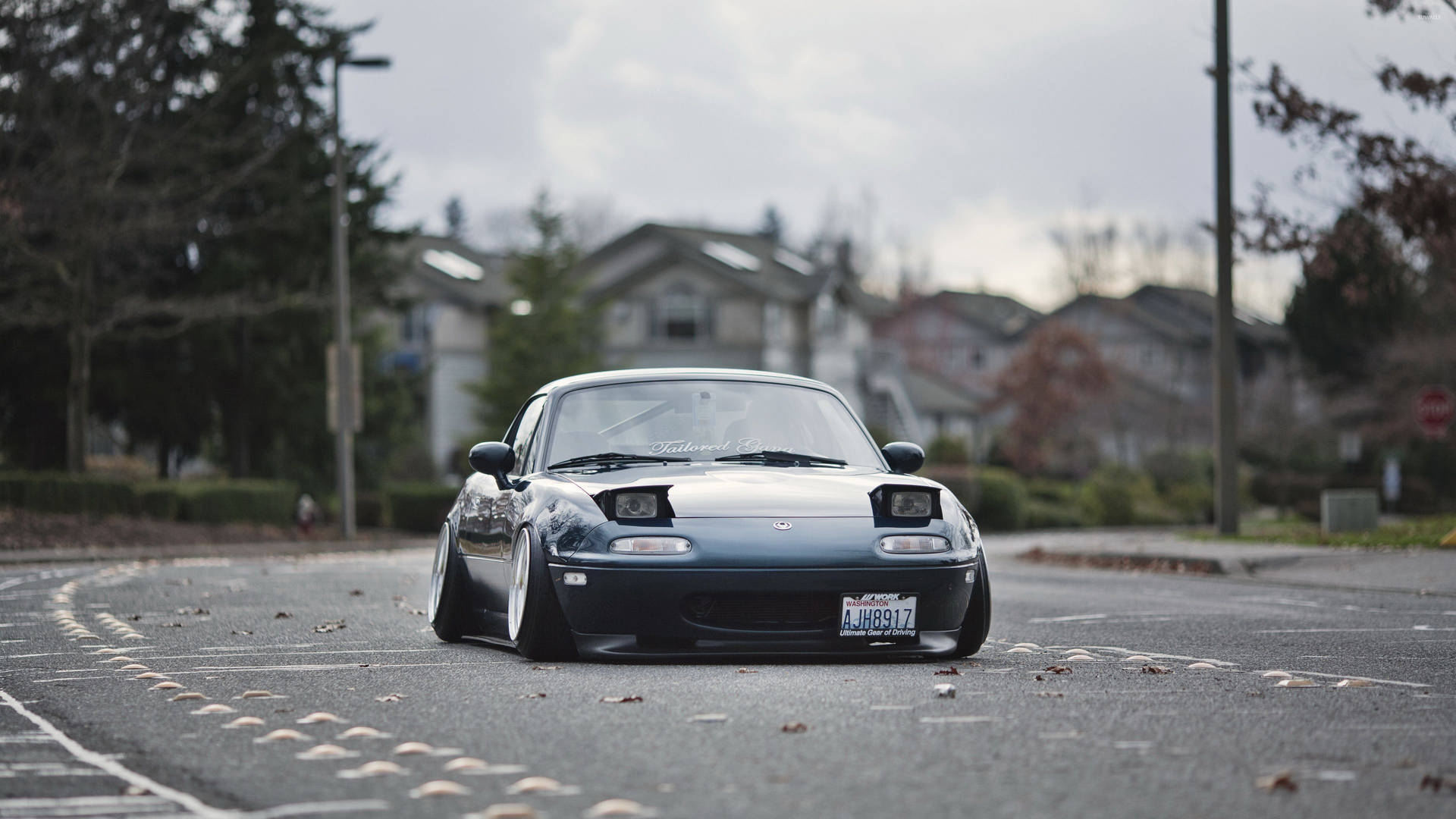 4k Jdm 1994 Mazda On Neighbohood Road Background