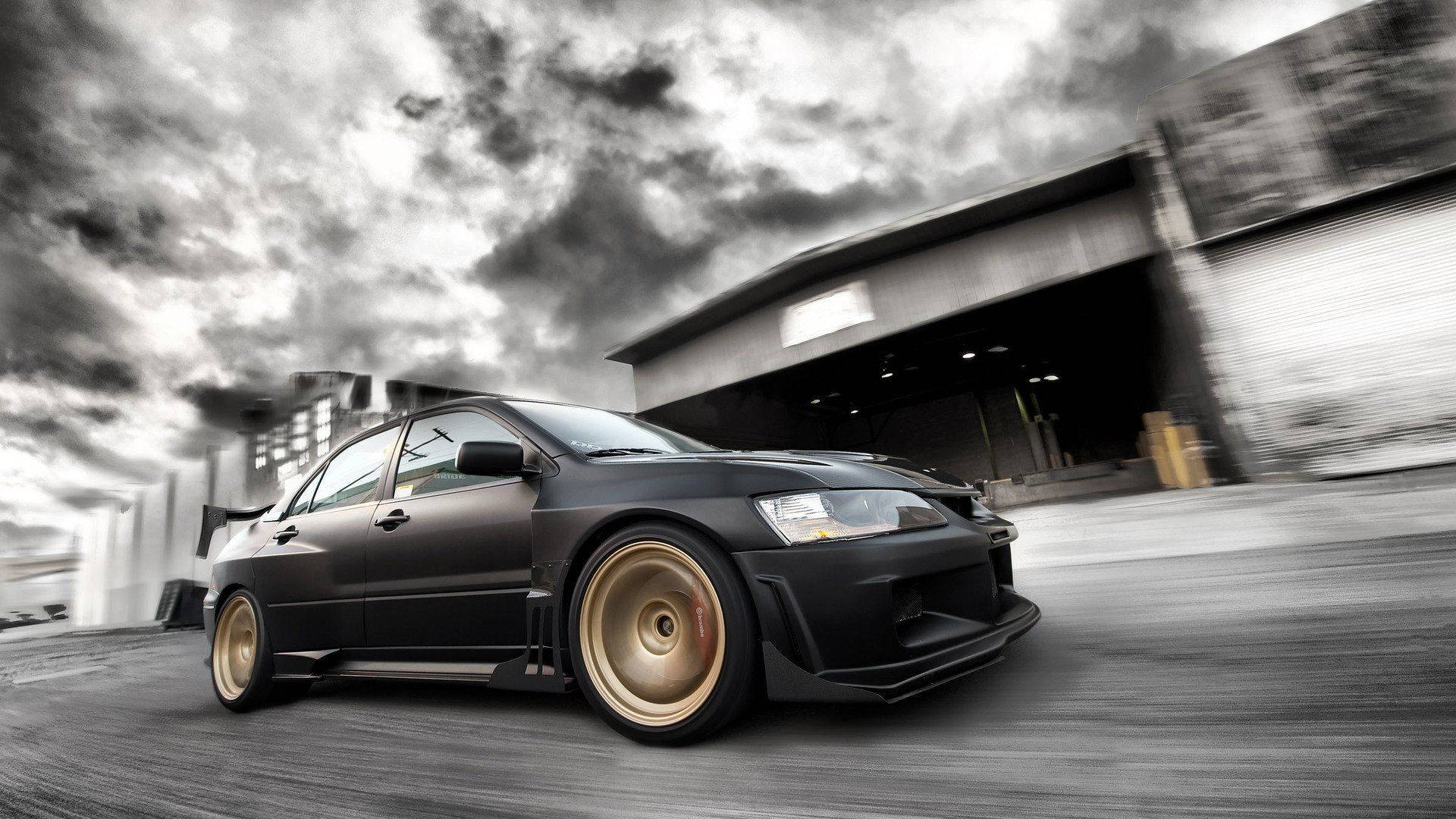 4k Jdm Mitsubishi Under Stormy Sky Background