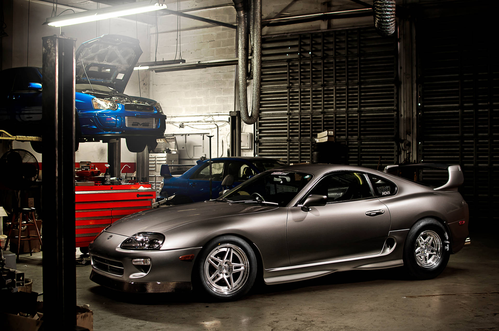 4k Supra In Machine Shop Background