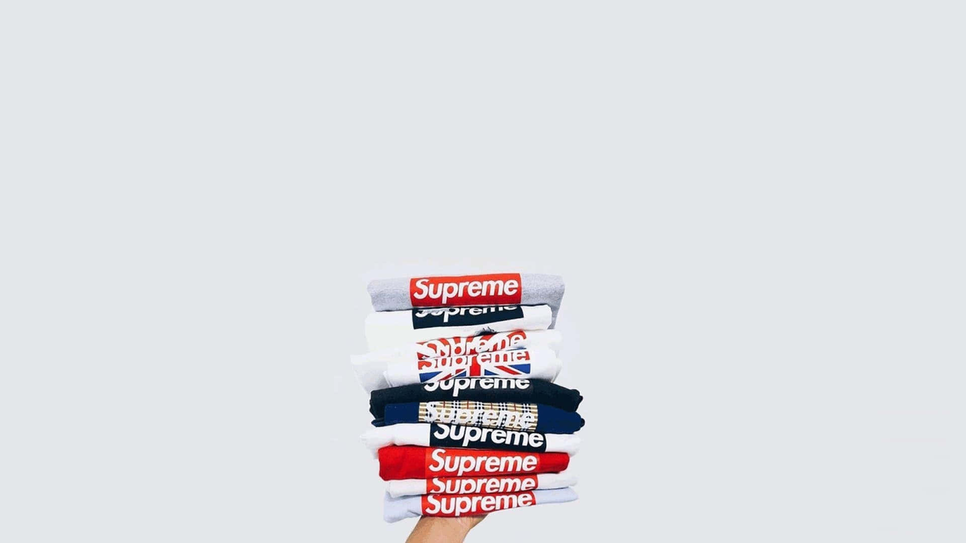 4k Supreme With Folded Shirts Background