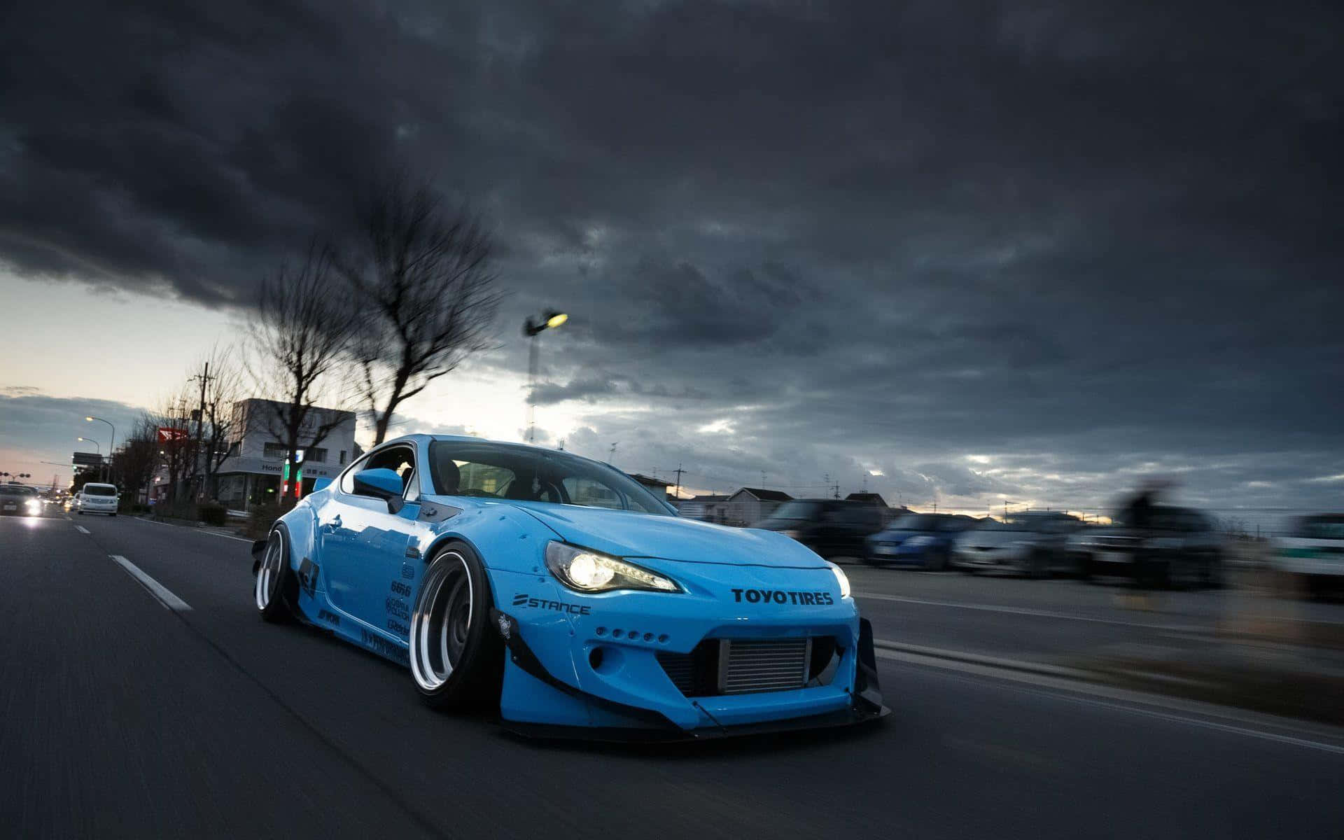 4k Toyota 86 Blue Car Drive Dark Clouds Background