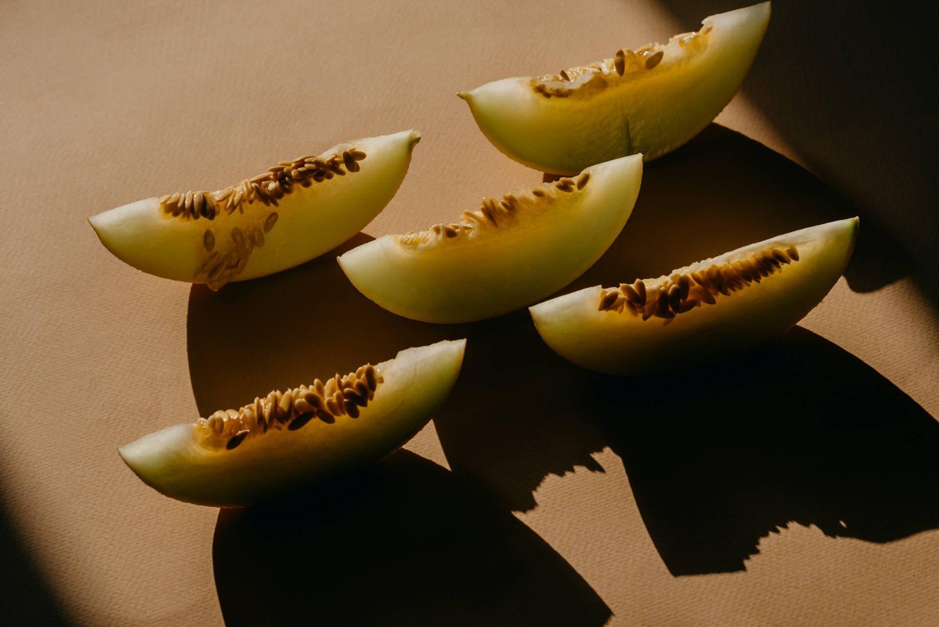 5 Pieces Of Sliced Honeydew Melon Background