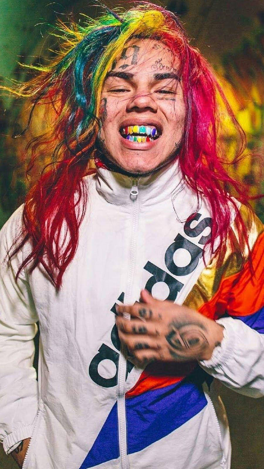 6ix9ine Shows Off His Grills Background