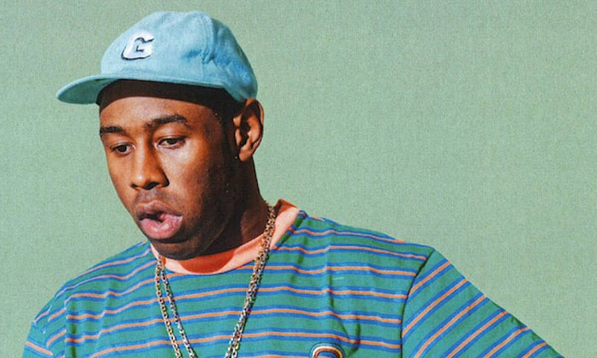 90s Rapper Tyler Making A Playful Face Background