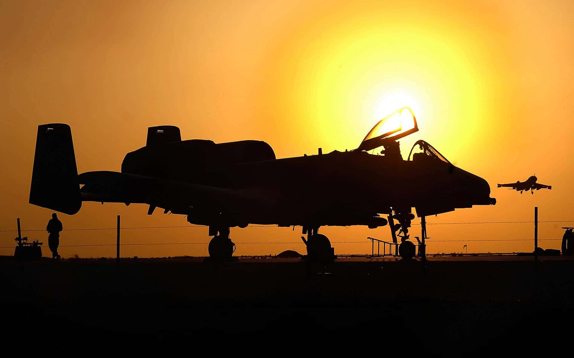 A 10 Warthog Silhouette Background