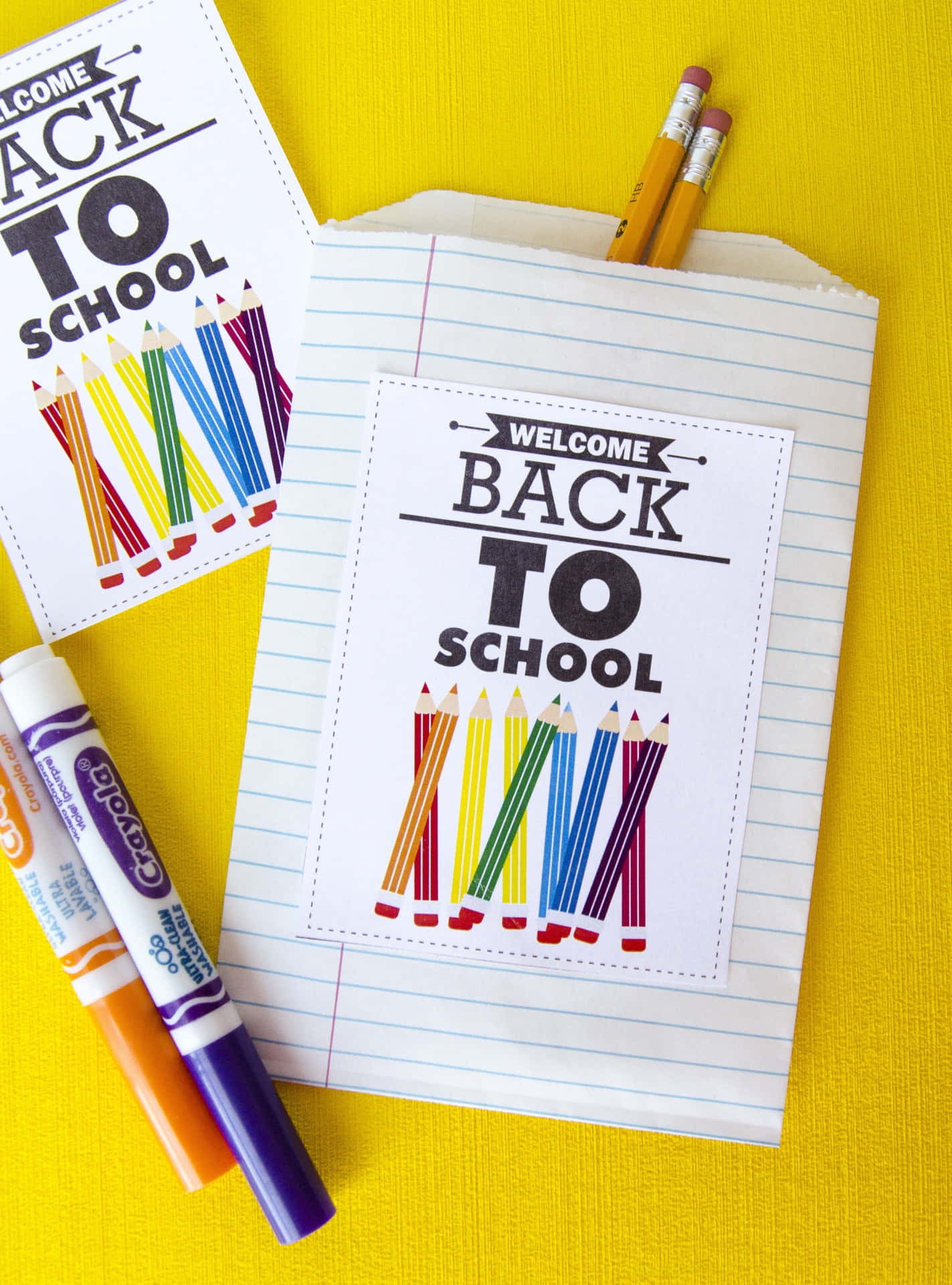 A Back To School Bag With Crayons And Markers