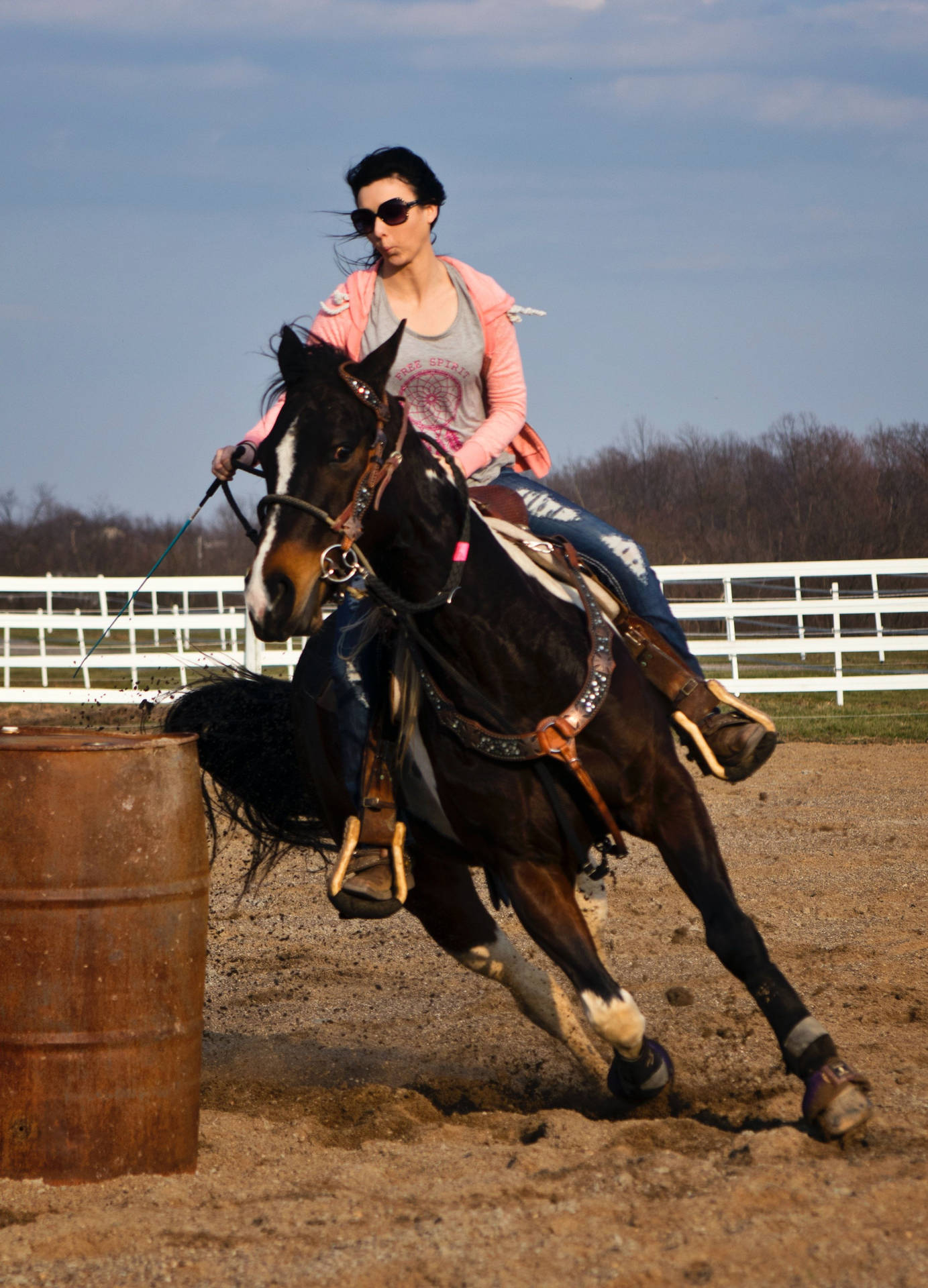 A Barrel Racer In Action Background