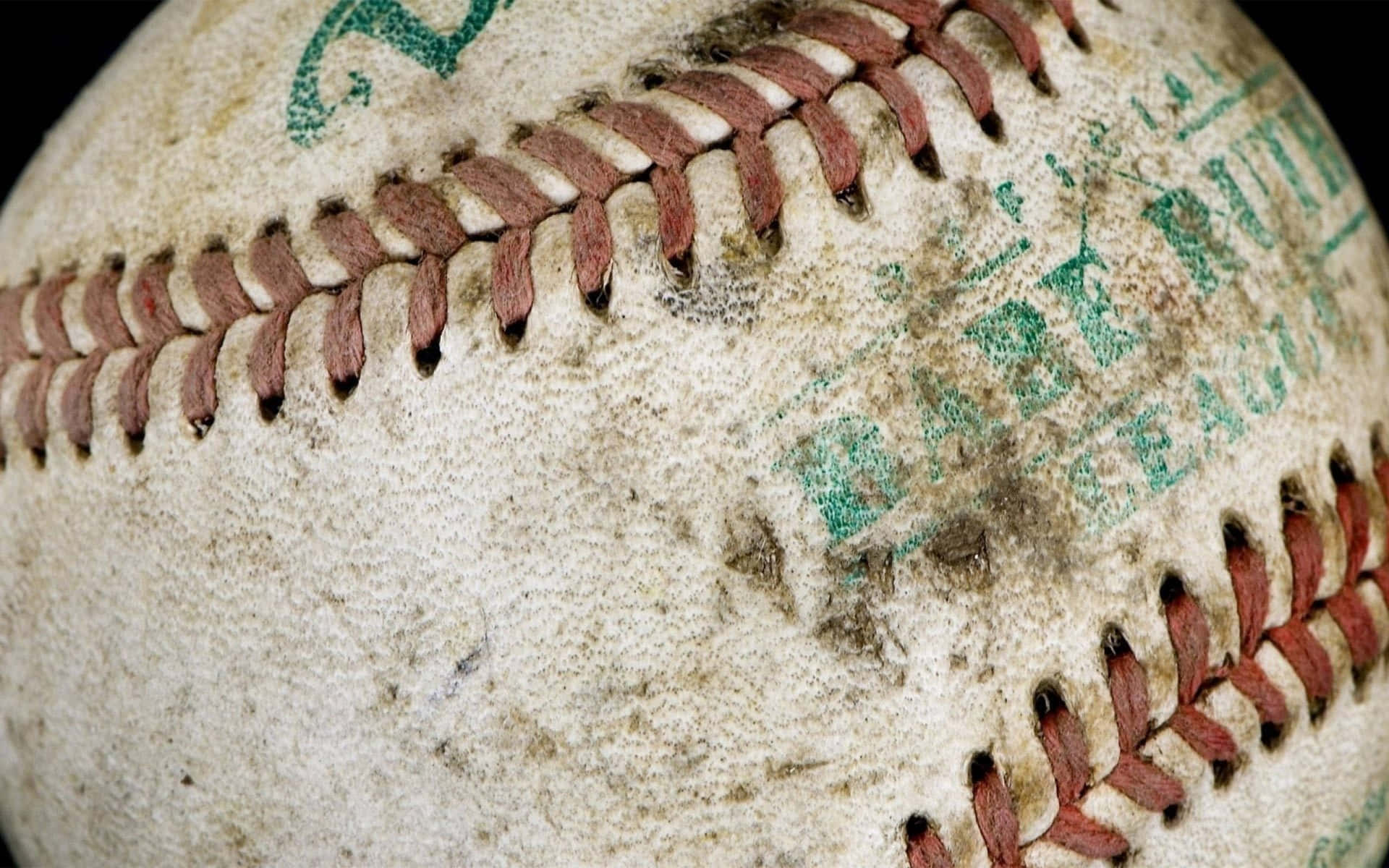 A Baseball Is On A Black Background Background