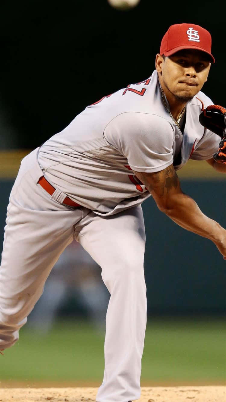 A Baseball Player Is Throwing A Ball Background