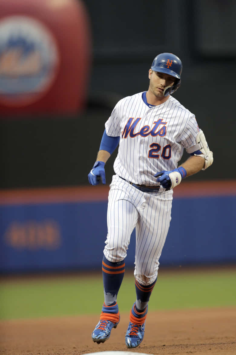 A Baseball Player Running On The Field Background