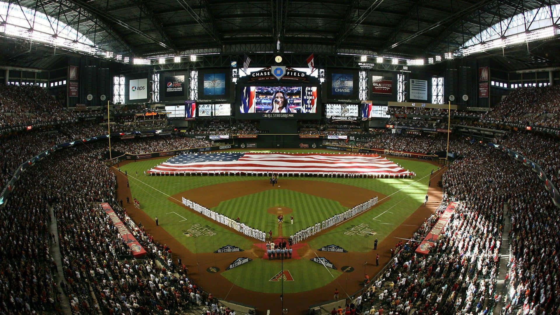 A Baseball Stadium With An American Flag On The Field