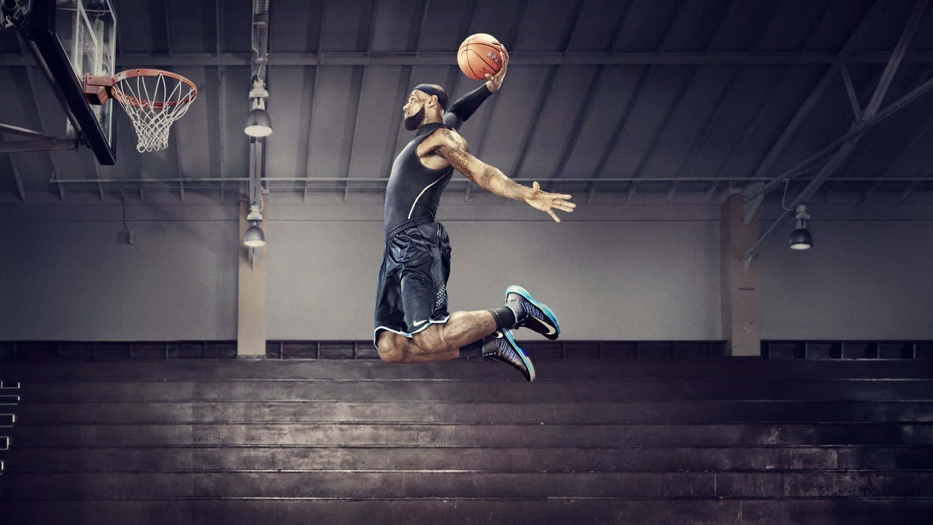 A Basketball Player In Mid Air Dunks A Ball Background