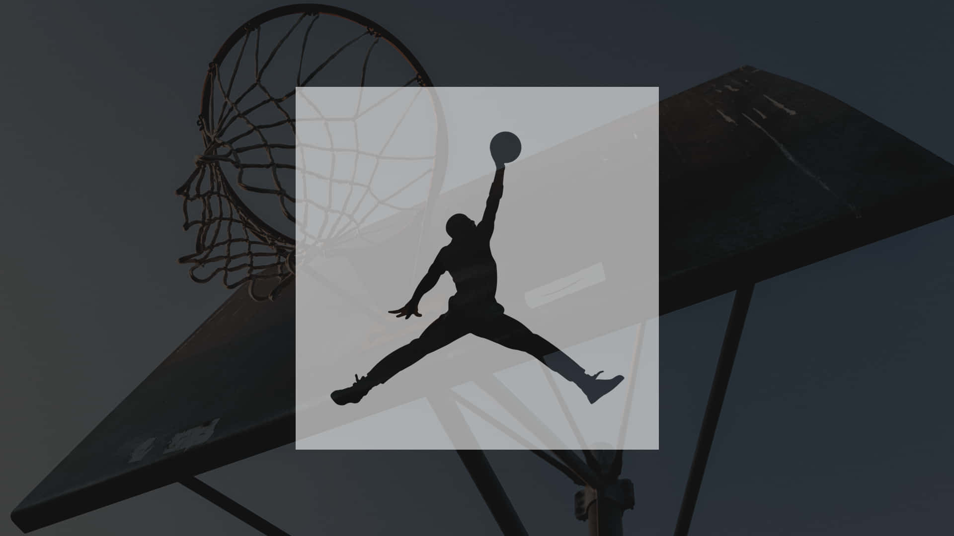 A Basketball Player Is Jumping Into A Hoop Background