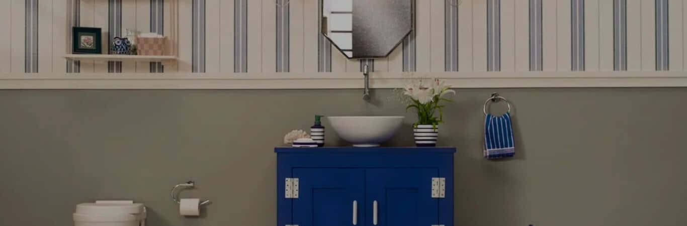 A Bathroom With Blue And White Striped Walls Background