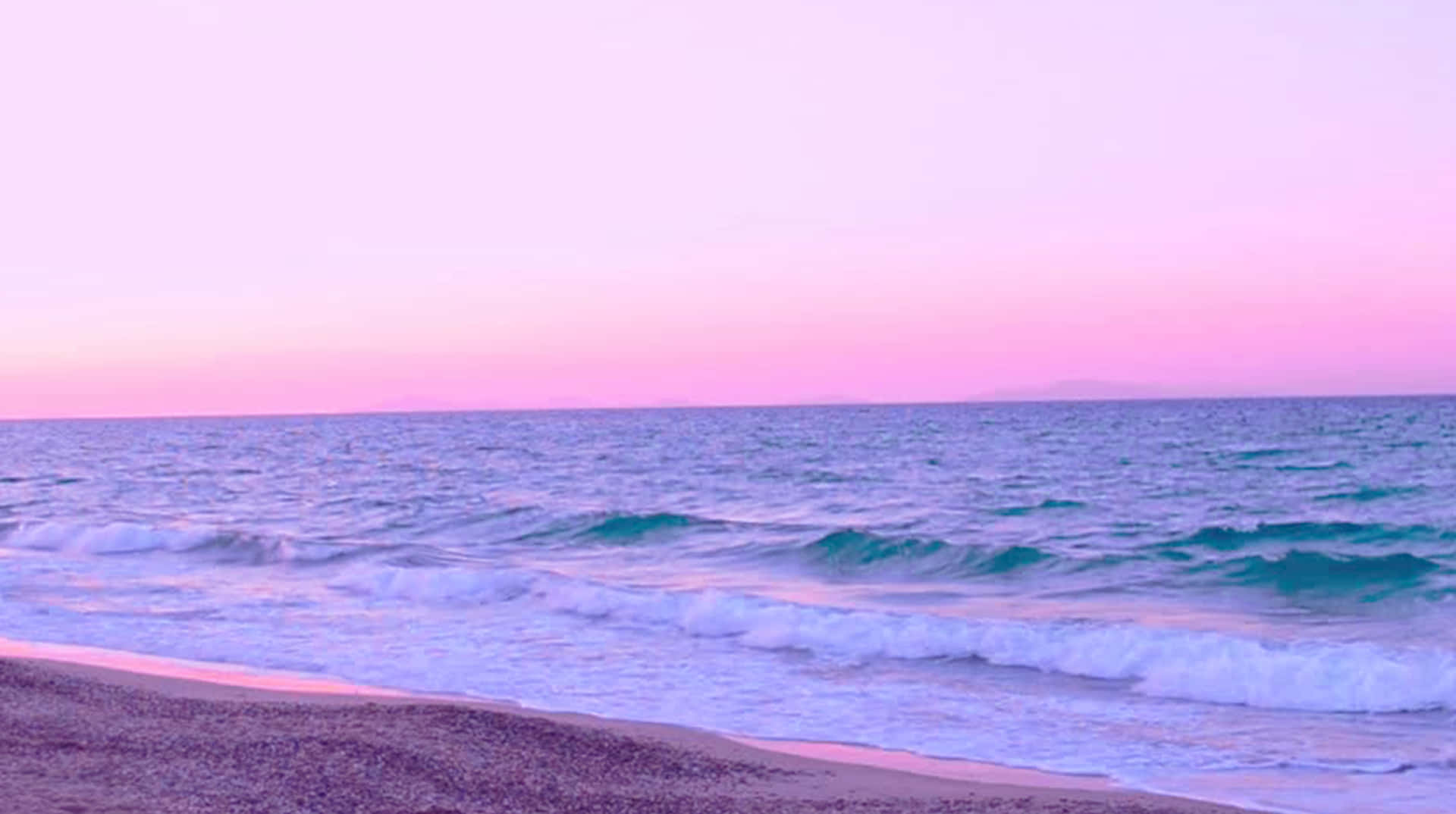 A Beach With Waves And A Pink Sunset Background