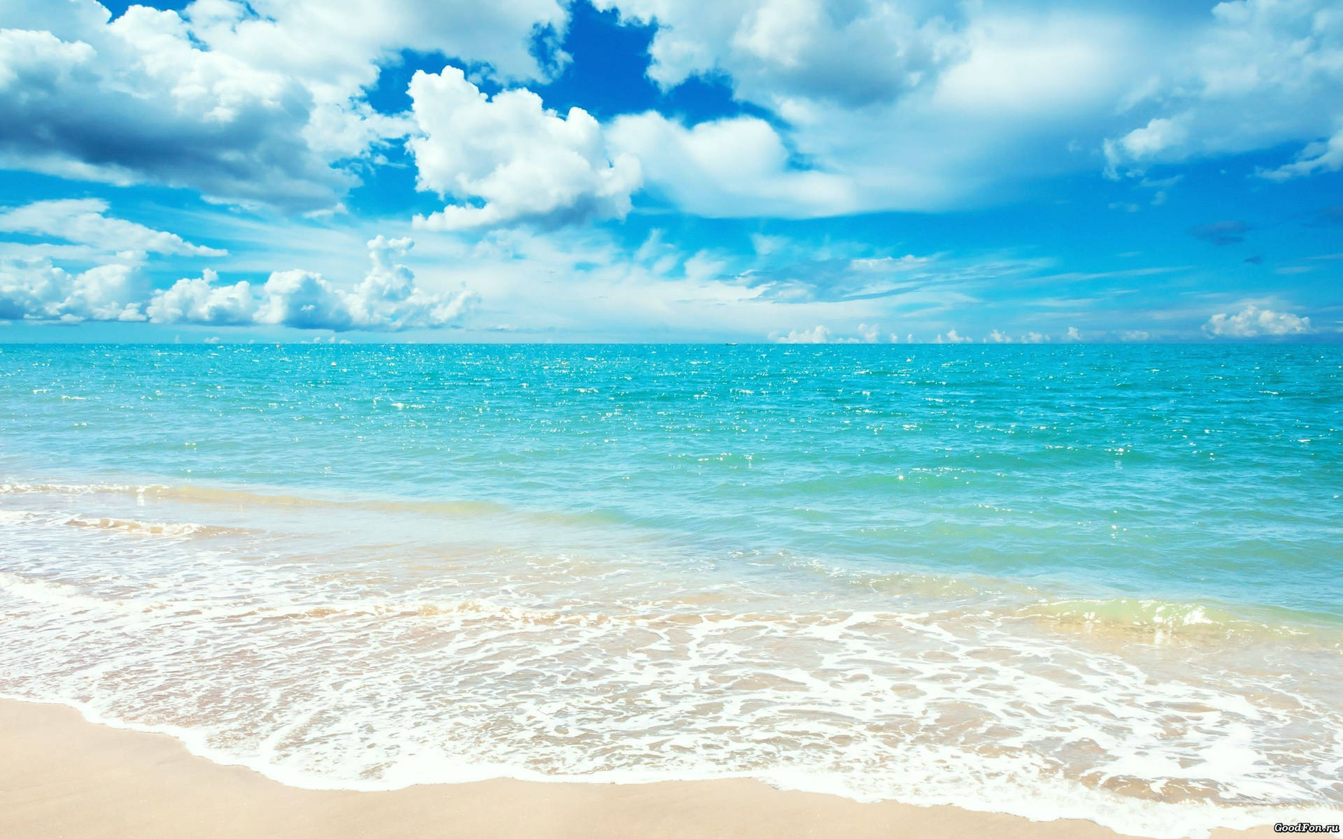 A Beach With Waves And Clouds Background