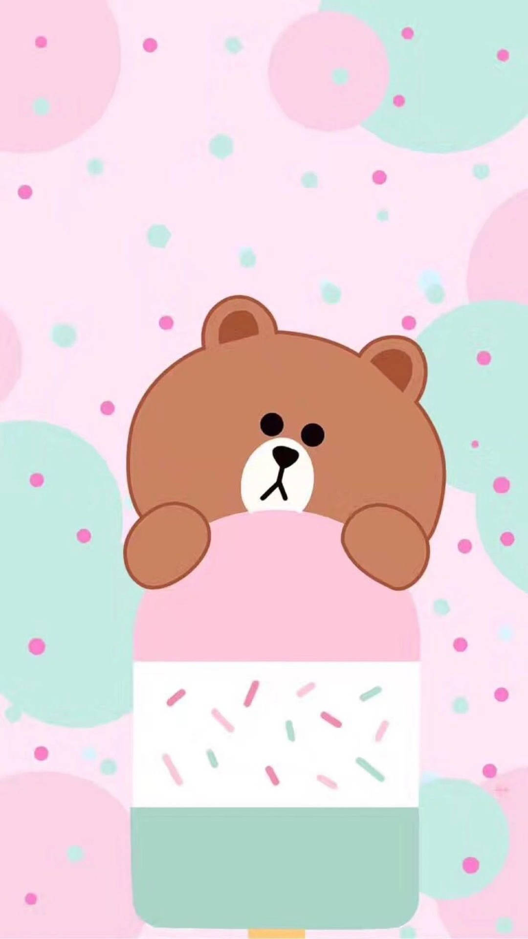A Bear Sitting On Top Of An Ice Cream Pop Background