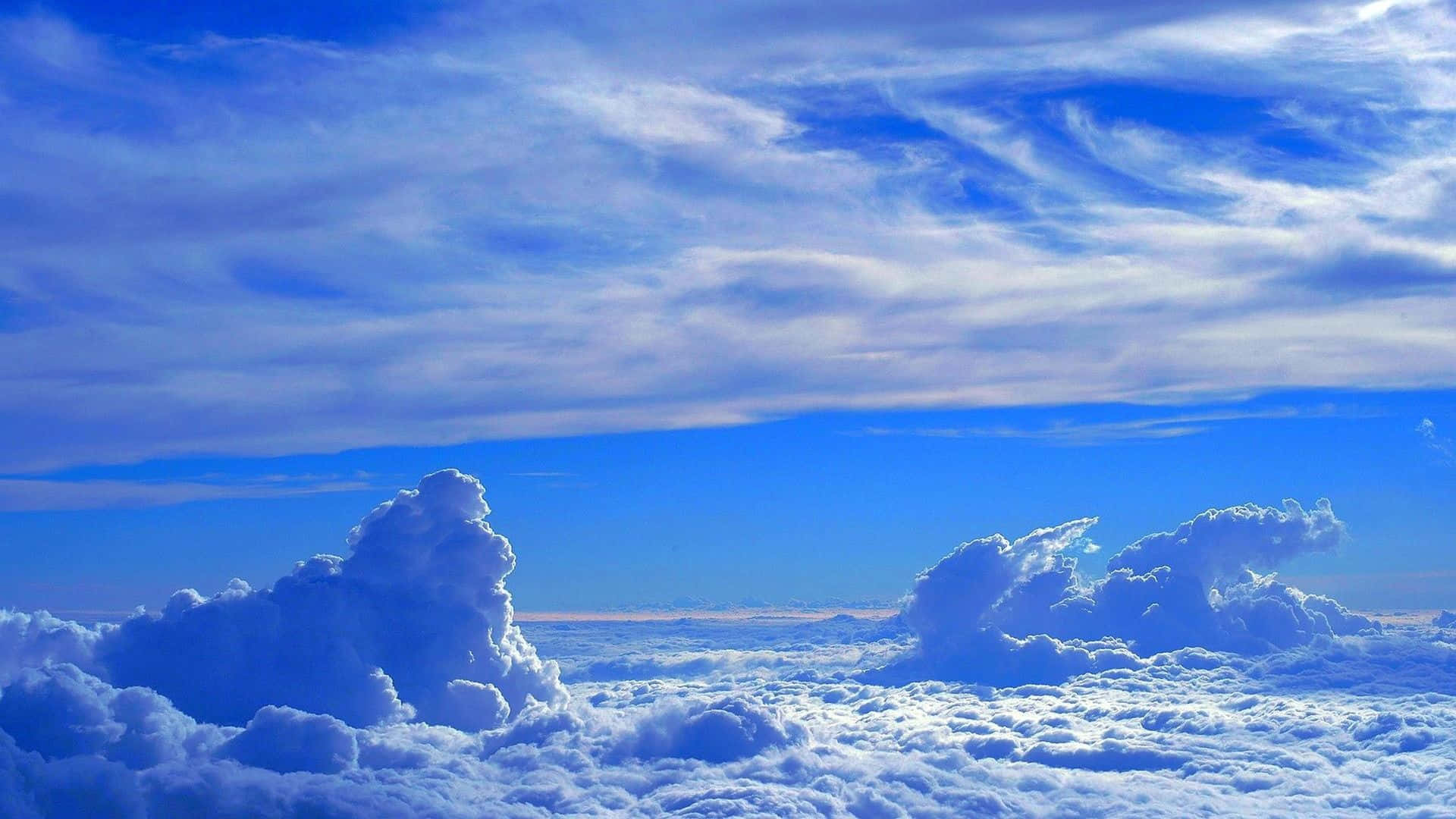 A Beautiful And Tranquil Sky Filled With Soft And Fluffy Clouds