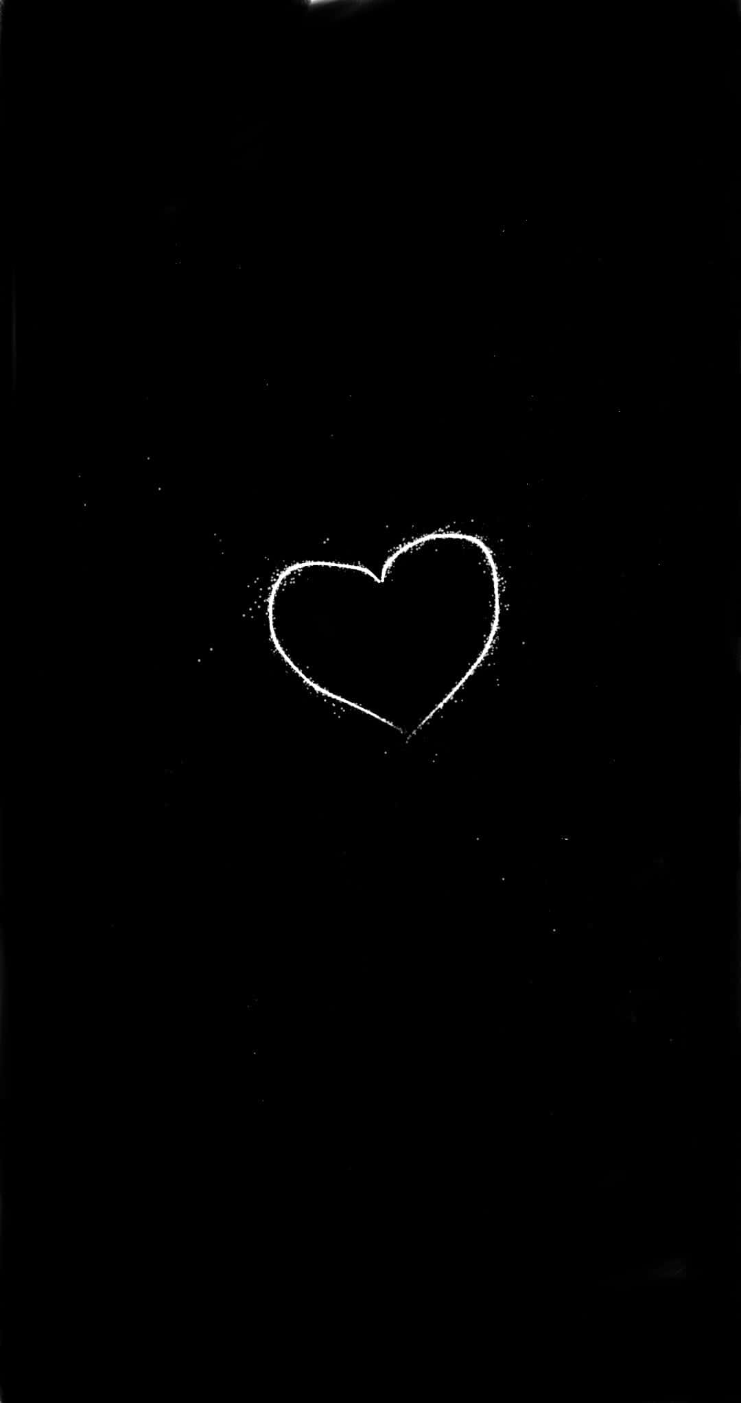 A Beautiful Black Heart With Shimmering Highlights Background