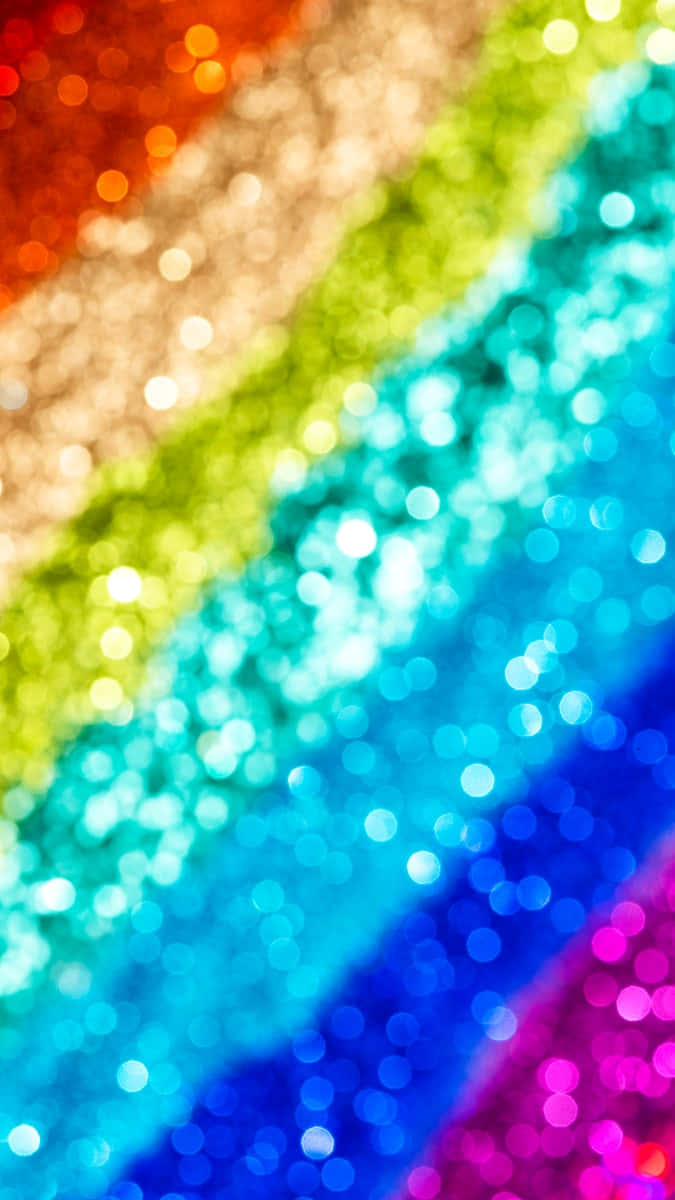 A Beautiful Burst Of Rainbow Sparkles In The Night Sky Background