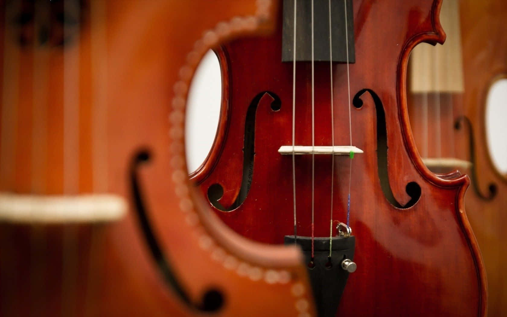 A Beautiful Four-string Violin Radiates A Soulful And Haunting Sound Background