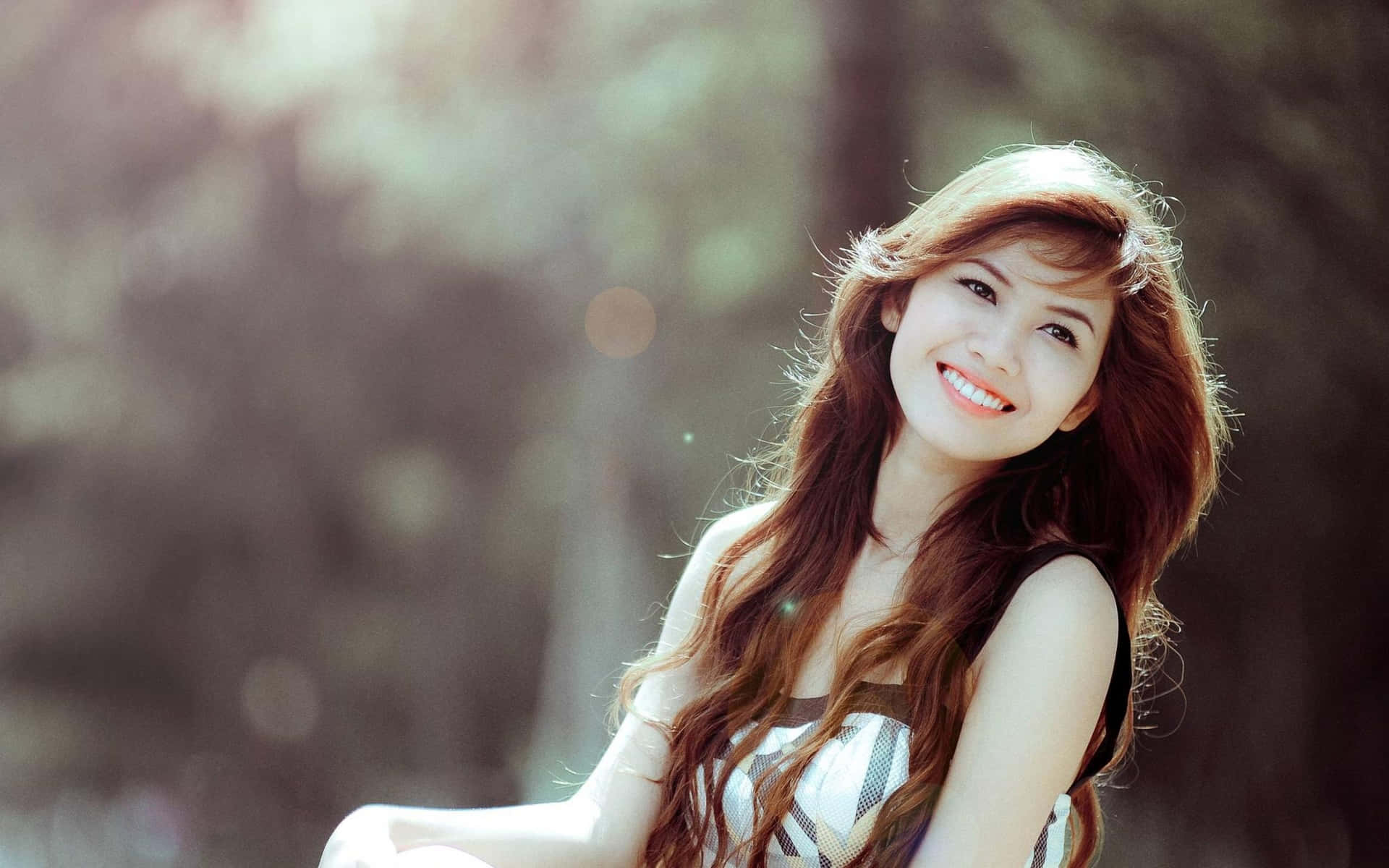 A Beautiful Girls Enjoying Her Desktop Background