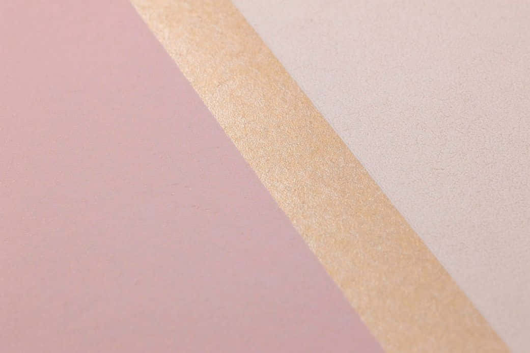 A Beautiful Golden And Light Pink Color Spectrum. Background