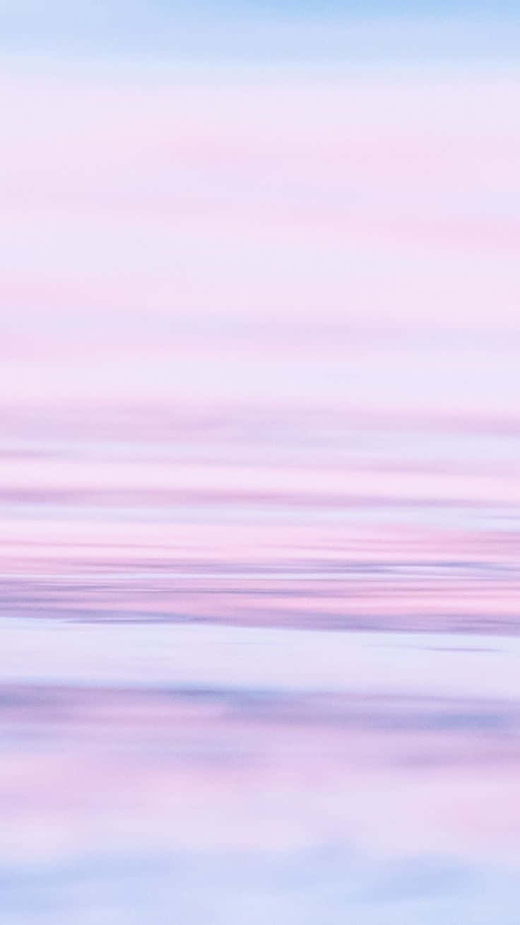 A Beautiful Landscape Of Pastel Blue And Pink Background