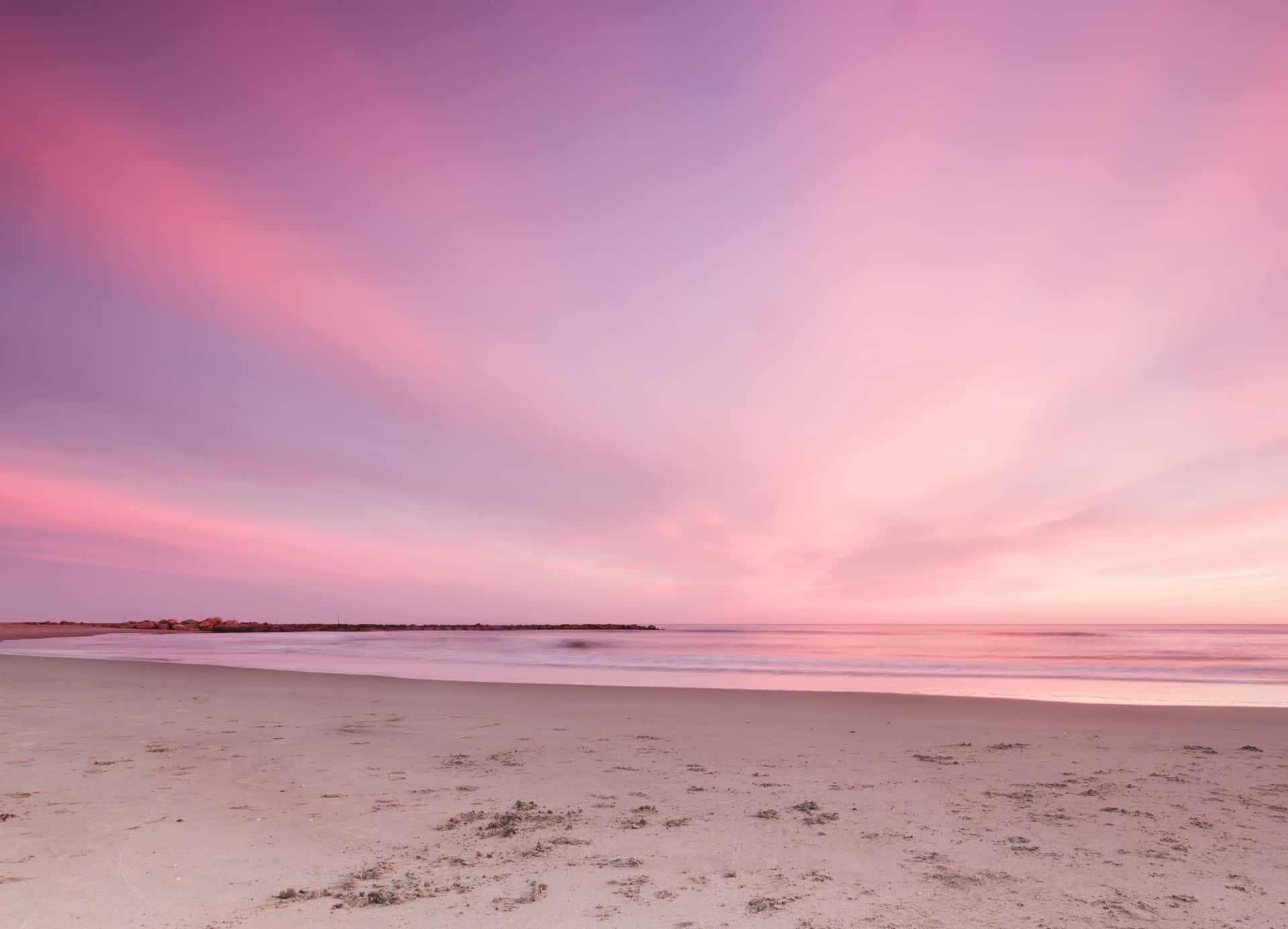 A Beautiful Pastel Beach In The Sunshine Background