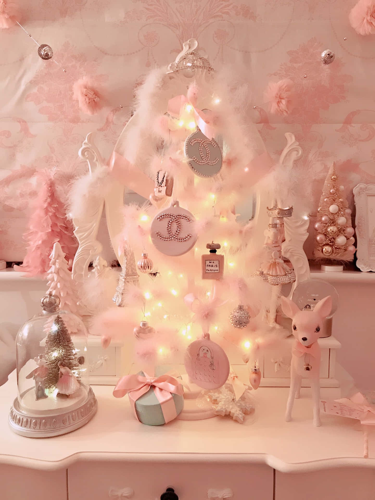 A Beautiful Pink Christmas Tree Brings Holiday Cheer To Any Home Background