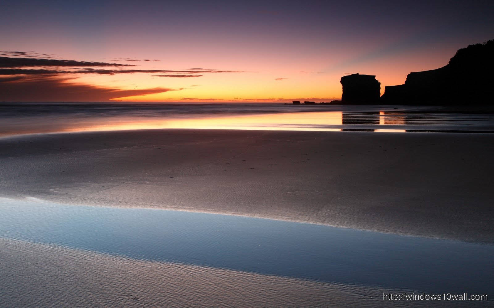 A Beautiful Sunset Across The Horizon Background