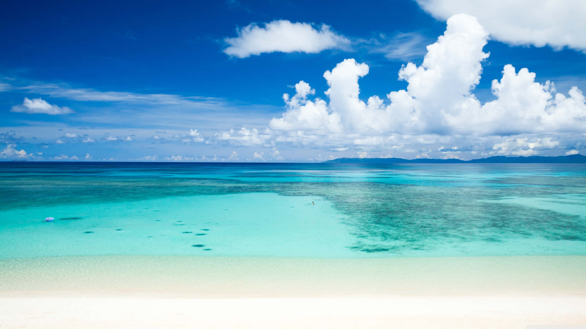 A Beautiful Tropical Beach Bathed In Golden Sunlight Background