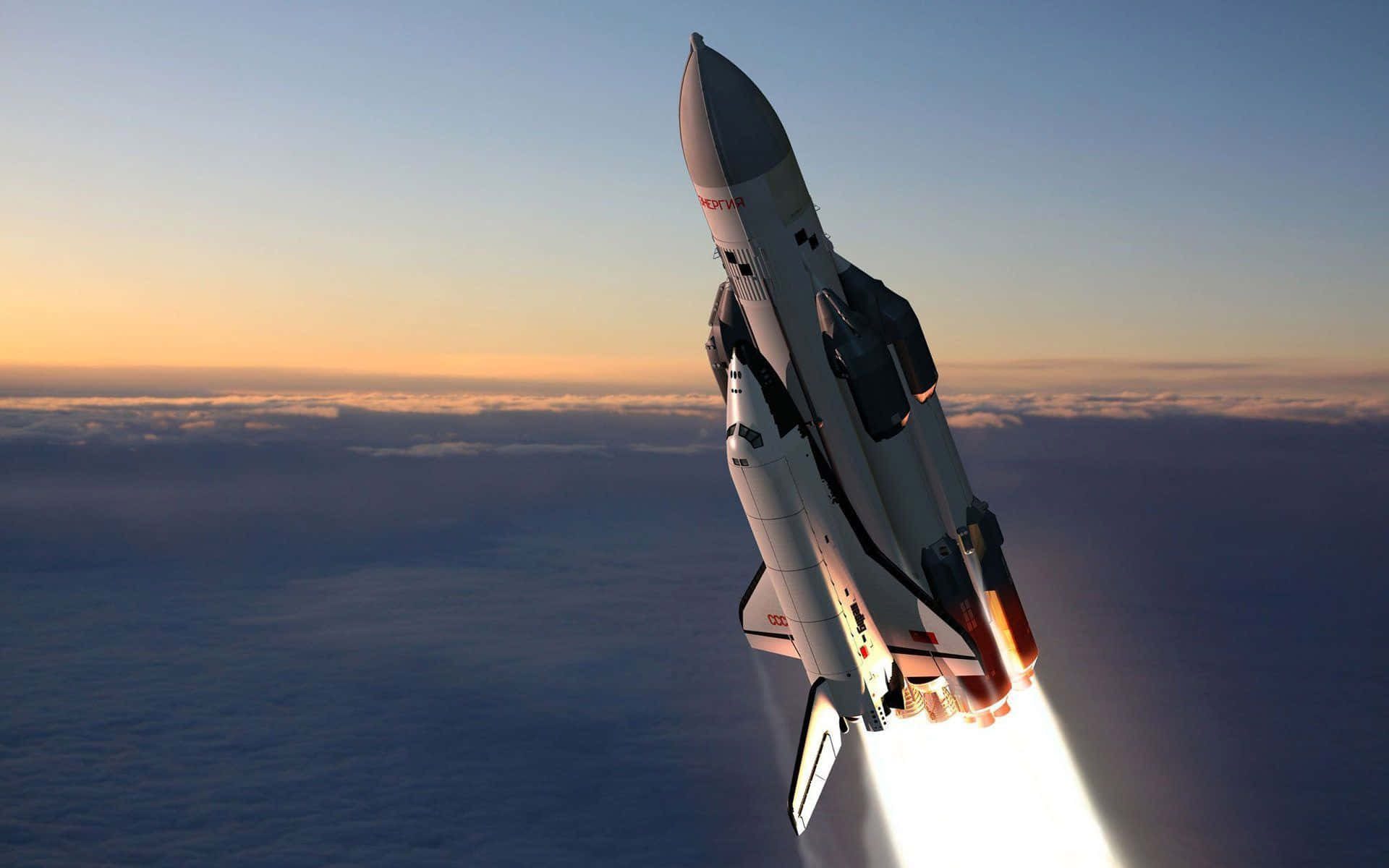 A Beautiful View Of A Space Shuttle Soaring In The Clouds