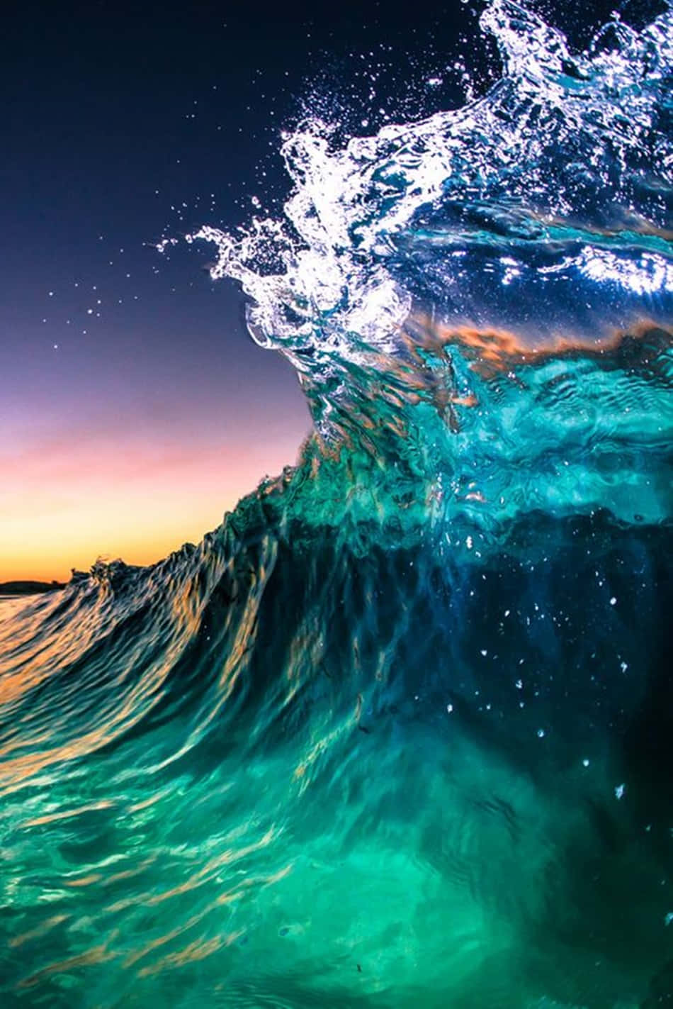 A Beautiful Wave Of Blue And Pink Colors Engulfed In The Sun. Background